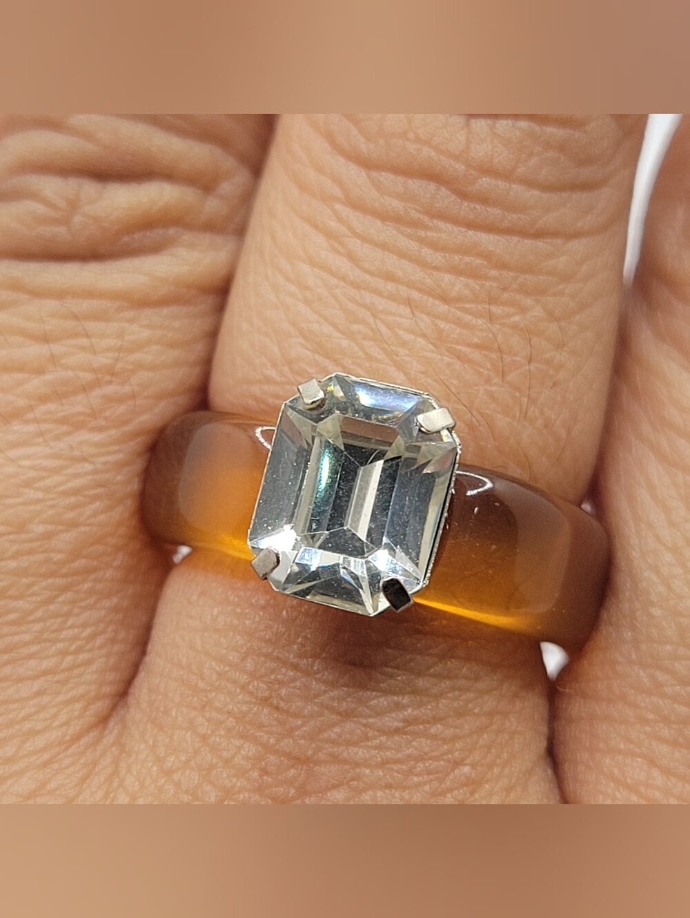 Clear Emerald-Cut Crystal Ring on Amber Toned Lucite Band
